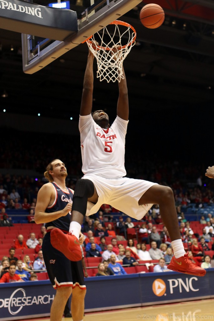 Steve McElvene slams two of his 15 points. Chris Santucci/Multimedia Editor